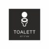 Panneau de toilettes noir et blanc avec un pictogramme représentant des toilettes ; le mot « toilettes » figure sous le symbole et le texte en braille en bas
